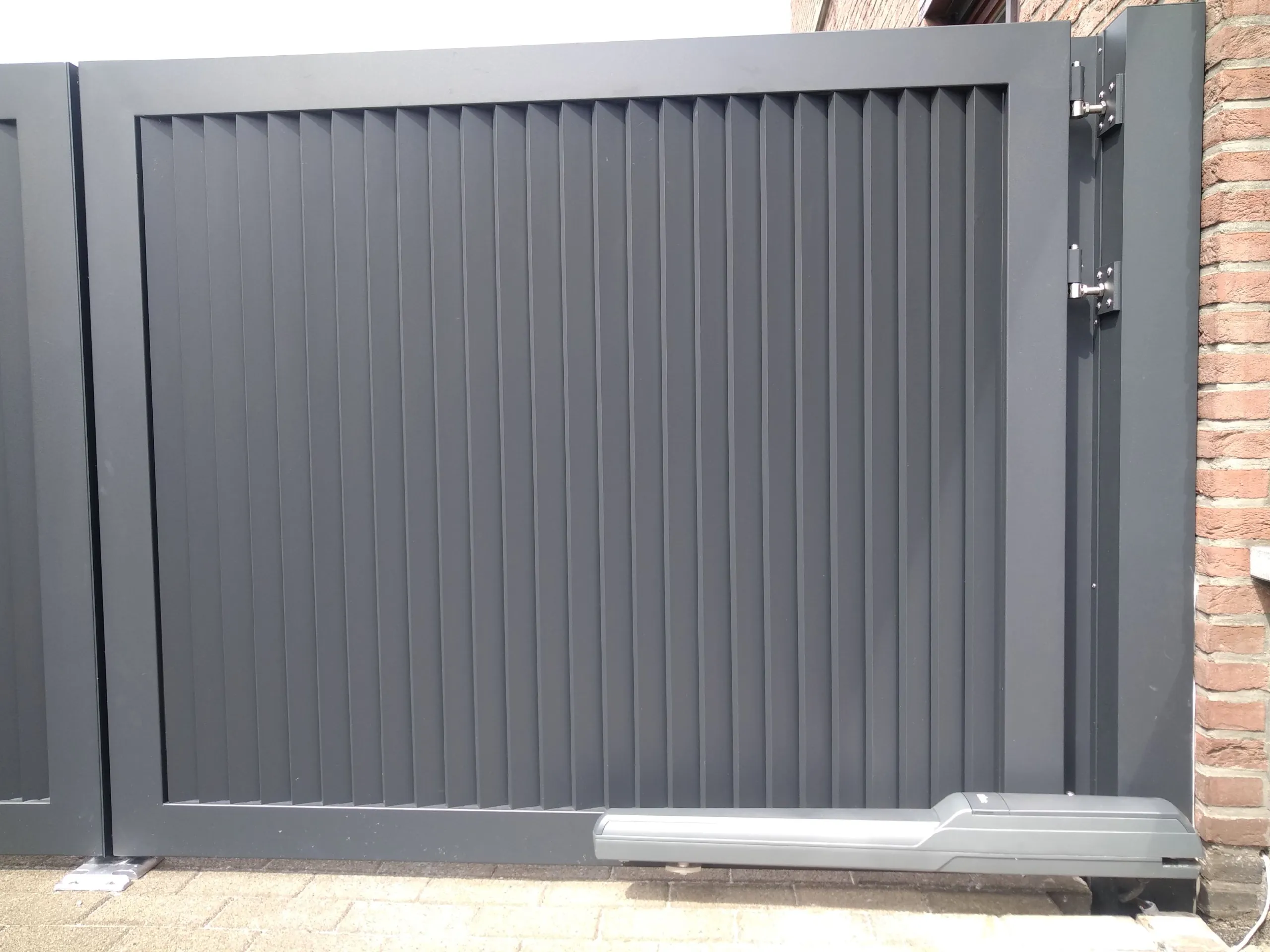 Dubbele draaipoort geautomatiseerd